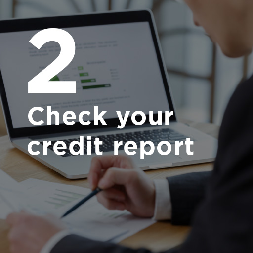 Check your credit report A business person working in front of the a laptop