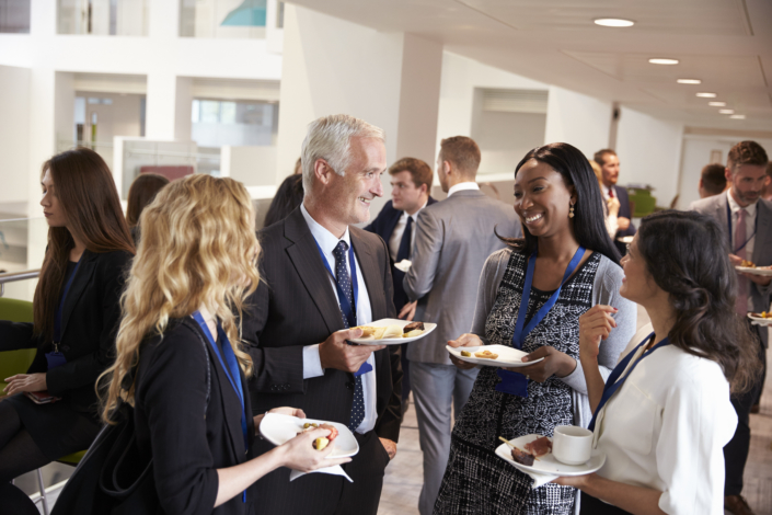 Delegates Networking During Conference Lunch Break Business referral network